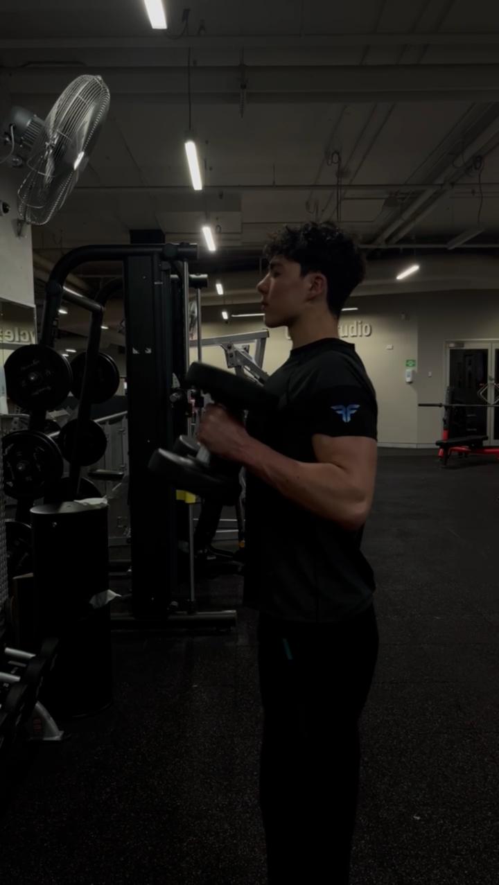 Ryan doing dumbbell curls
