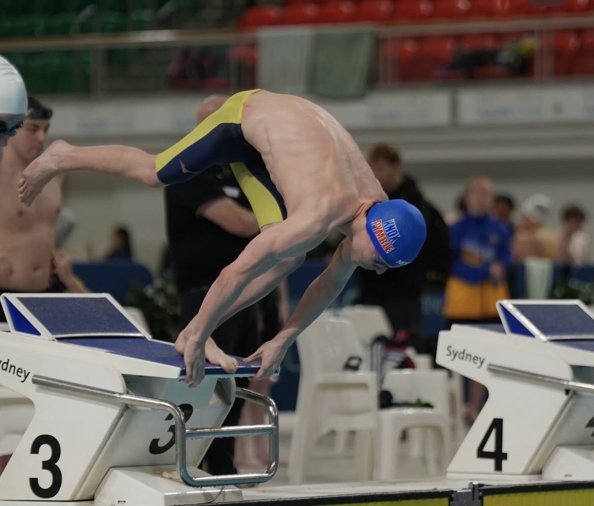 Dan diving from the blocks