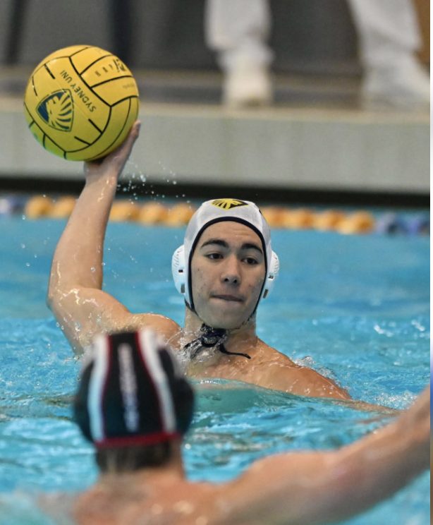 Ryan about to throw in a water polo match